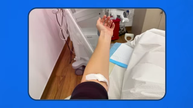 A person's arm with a bandage after a blood draw, indicating the frequent monitoring required during the process