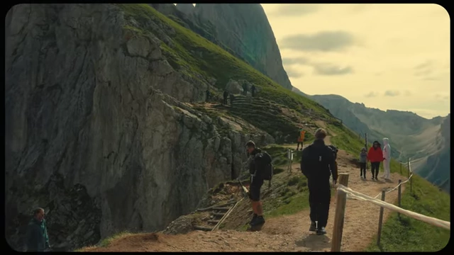 People hiking in a mountainous, natural landscape, emphasizing the "soul trip" concept of getting offline for inspiration.