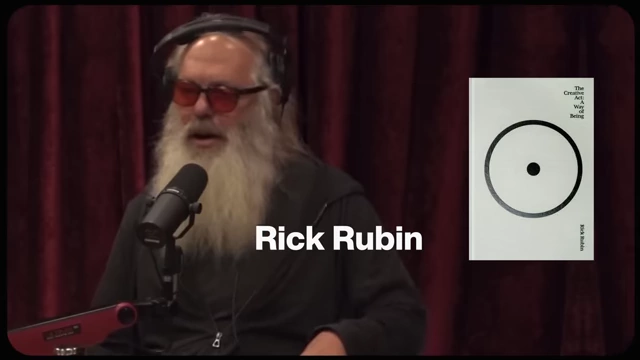 Rick Rubin speaking, with his book "The Creative Act" displayed, linking creativity to nature.
