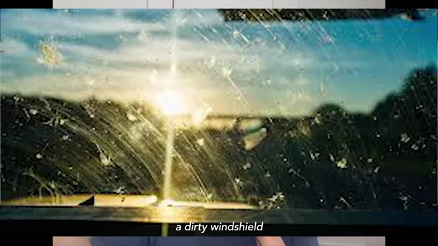 A dirty car windshield, symbolizing a mind cluttered with thoughts before morning journaling.