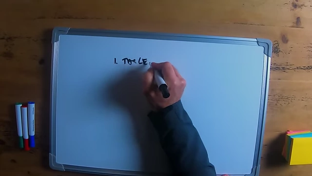 The speaker writing "targeted" on a whiteboard for PR strategy.