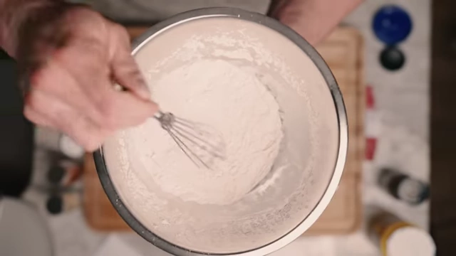 Whisking the cornstarch and spice mixture for the coating