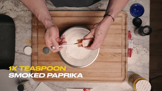 Adding paprika to the cornstarch mix