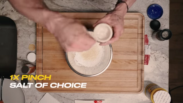 Adding a pinch of salt to the dry mix