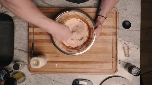 Whisking the sauce ingredients together until smooth