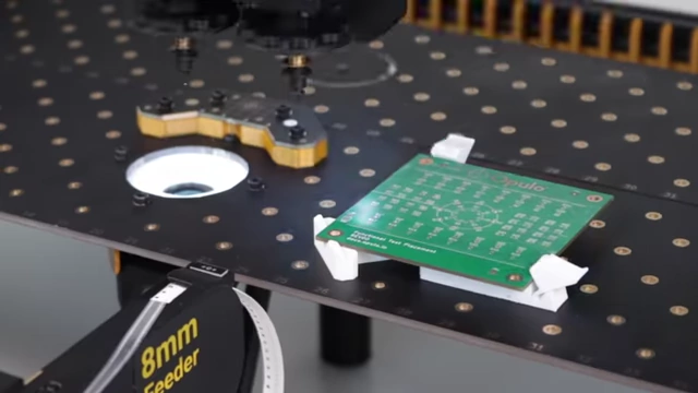 LumenPnP pick and place machine assembling components onto the etched PCB