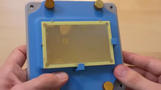 The alignment jig securely holding a VIA Grid PCB