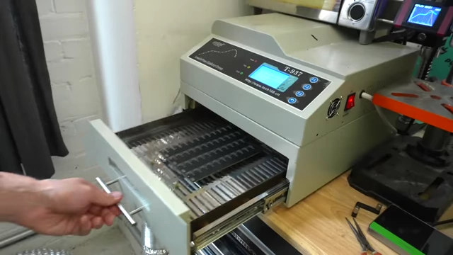 A reflow oven used for soldering components onto the PCB