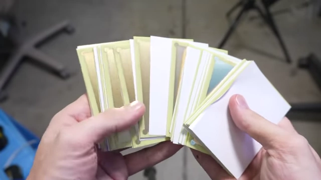 A stack of VIA Grid standardized PCB blanks ready for use