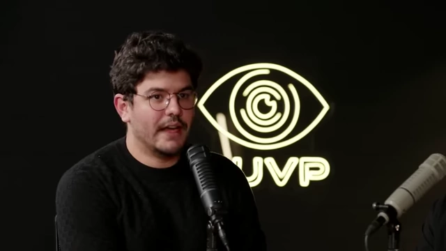 Speaker emphasizing the disproportionate value of tech vs. real-world goods