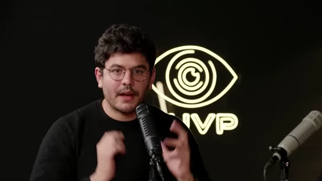 Speaker making a point with a hand gesture