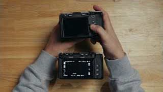 Comparing the backs of the FX3 (top, with dial) and FX5 (bottom, without dial)