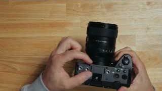 Front view of the FX5 with a lens, illustrating the lack of built-in NDs