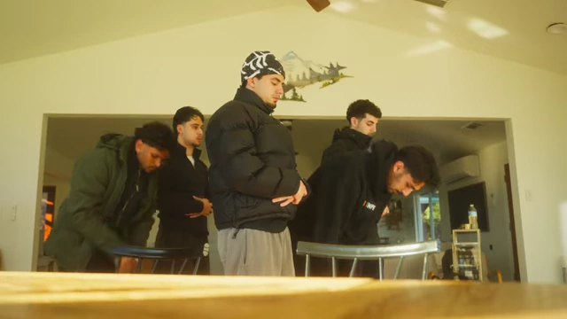 The team praying together before the hike