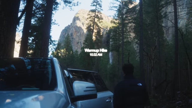 Text overlay indicating "Warmup Hike" at 10:32 AM with a waterfall in the background