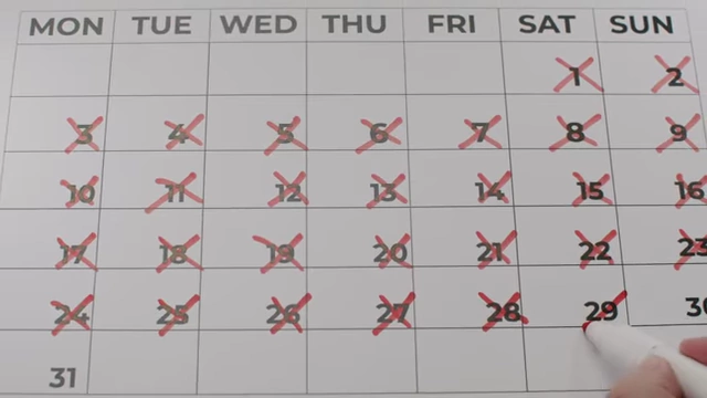 A calendar with days crossed out in red