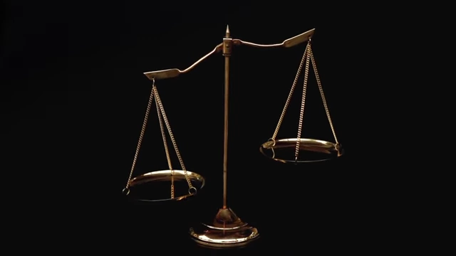 A set of golden scales, with one side tipped downwards, representing the pleasure-pain balance