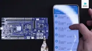 The nRF Connect for Mobile app interface displaying a list of nearby Bluetooth LE devices during a scan, with "Peripheral LBS" identified as a connectable device.
