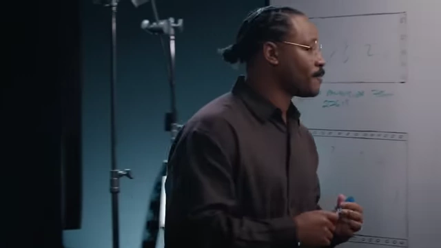 Ryan Coogler outlines his vision on a whiteboard, emphasizing his creative process.