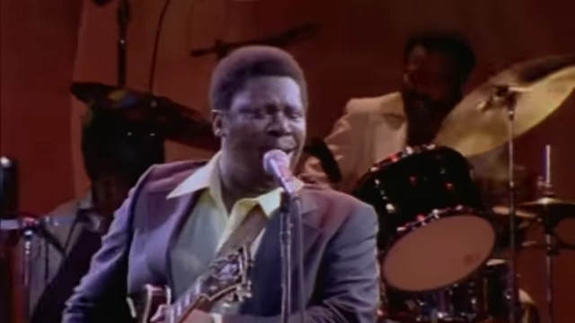 Blues legend B.B. King performs on stage, representing the rich history of Black music.