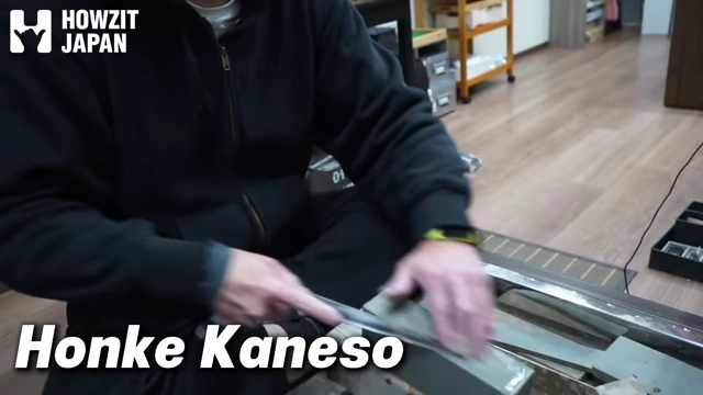 Craftsman sharpening a knife at Honke Kanesou