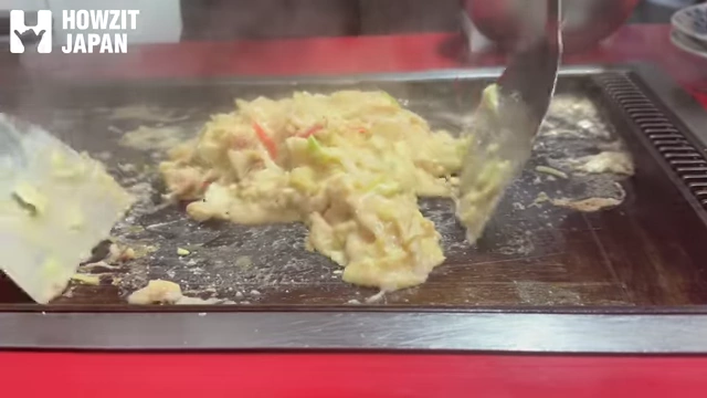 Ingredients being mixed and cooked for Monjayaki