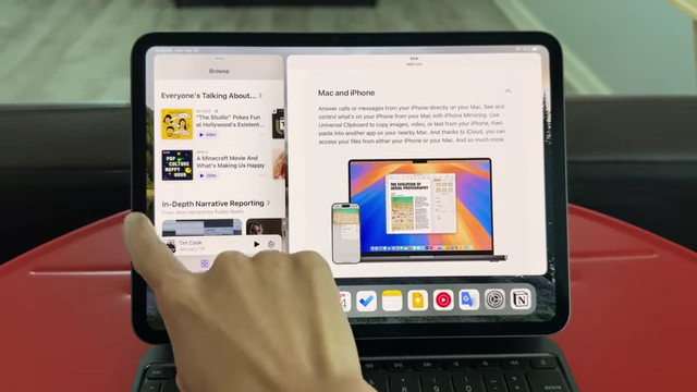 The iPad Pro using Stage Manager, with a hand performing a gesture to navigate between open application windows.
