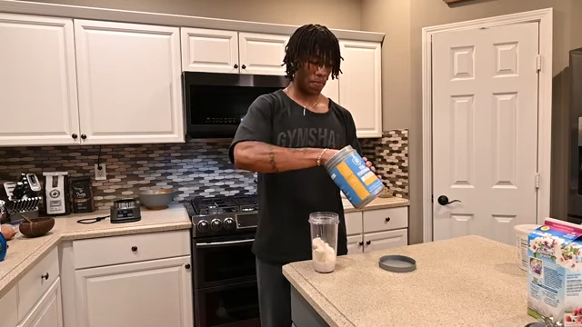 Adding one scoop of protein powder