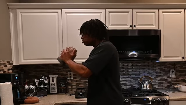 Vigorously shaking the blender during the blending process
