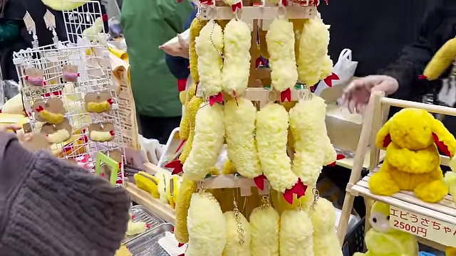 Adorable shrimp tempura plush keychains, a popular niche item.