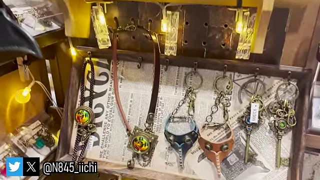 Handcrafted steampunk-style accessories, including detailed plague doctor masks and pouches.