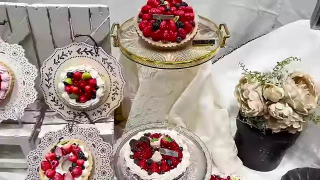 An impressive display of highly realistic fake cakes and fruit tarts.