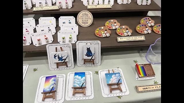 Miniature artist palettes and tiny easel canvases, perfect for art lovers.[<a href="https://youtube.com/watch?v=ElhtfgUvJiQ&t=131">131</a>]