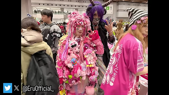 An attendee fully dressed in vibrant Decora Kei fashion, adorned with numerous accessories.