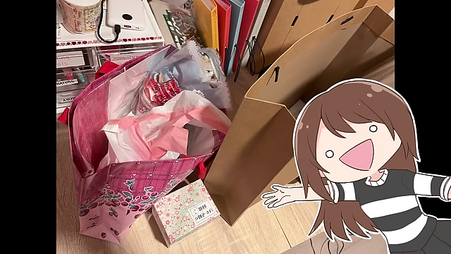 A collection of shopping bags filled with art purchases from Design Festa.