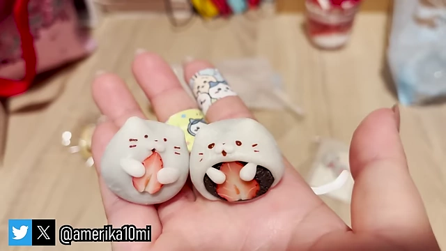 Adorable miniature cat-shaped Ichigo Daifuku clay pieces and matching earrings.