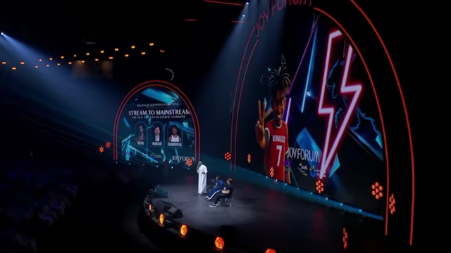 The stage setup for the 'Stream to Mainstream' panel, highlighting the event's global reach and theme