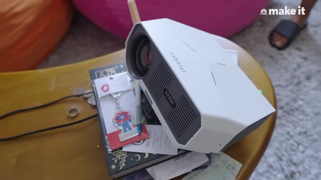 Projector screen used for watching movies and anime instead of a traditional TV.