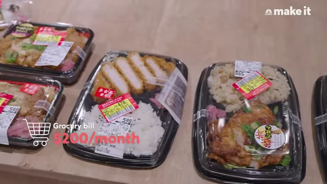Packaged meals in a grocery store, illustrating Lexi's $200/month grocery bill.