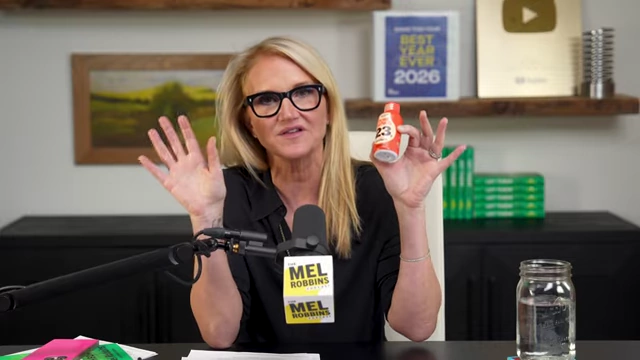 Mel Robbins holding a Pure Genius protein shot, a key part of her new company venture