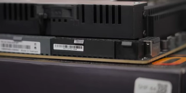 Motherboard showing a second 24-pin auxiliary power connector for dual PSU