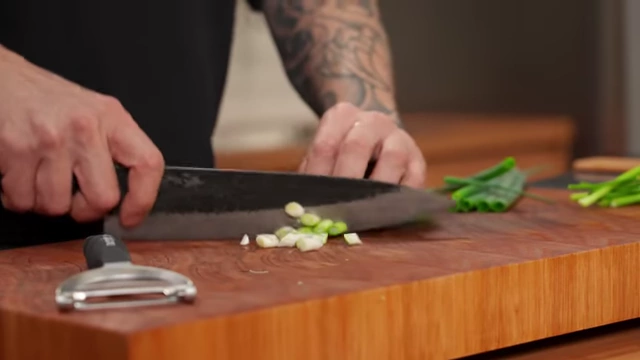 Small, uniformly sliced white parts of spring onions