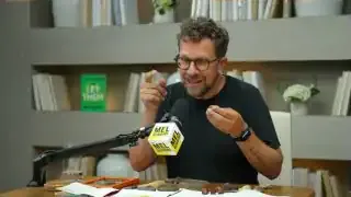 Phil Cook showing a heart-shaped rock he found.