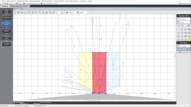 The configuration software for a laser scanner, showing a grid with defined safety zones (red and yellow areas)