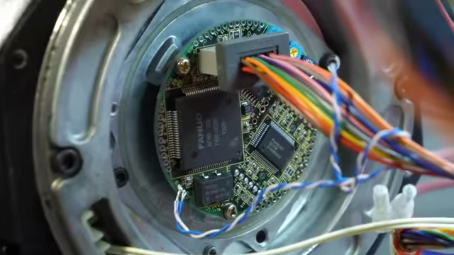 A close-up of a robot motor's encoder board