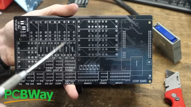 A custom E-stop board with multiple relays and terminal blocks