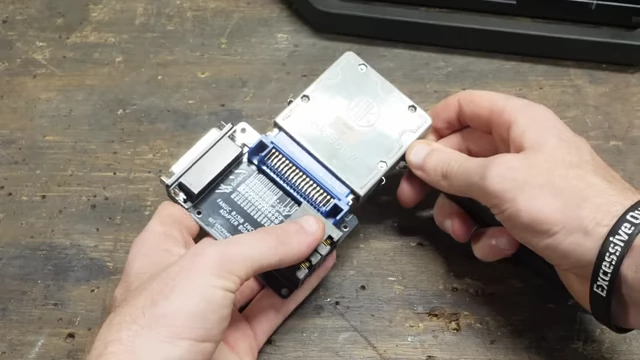 A custom encoder adapter board with the original robot connector attached