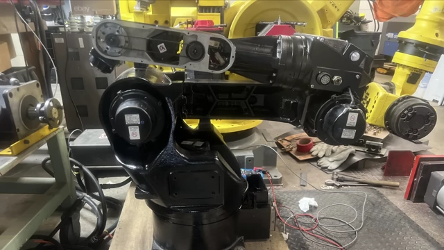 A refurbished Yasawa Motoman UP6 robot arm, repainted black