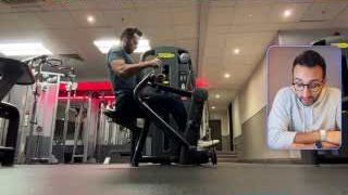 Ali Abdaal is shown lifting weights at the gym, illustrating his flexible gym routine.