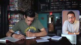 Ryan Holiday is seen diligently writing on note cards, illustrating his consistent writing system.
